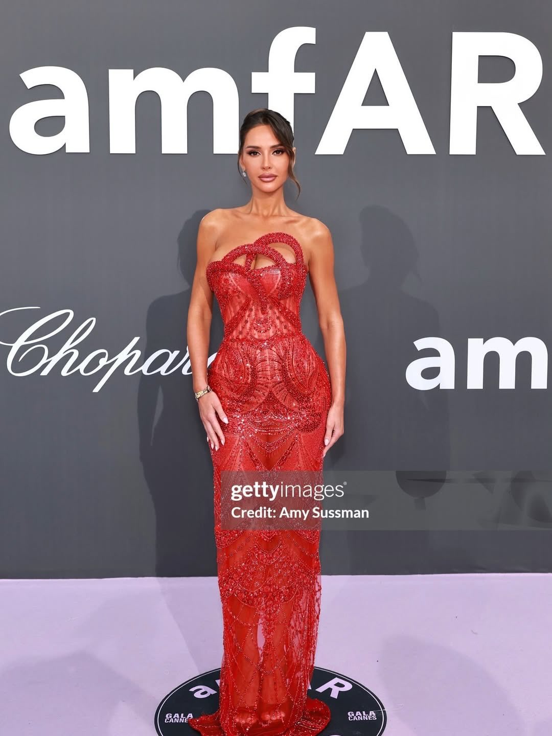 Benita Kaikarytė Wearing our RUBY TWIST gown at the amfAR Gala Cannes