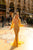 girl-with-yellow-longsleeved-dress